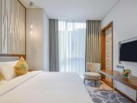 Grand Mercure Dubai City客房内的一张或多张床位