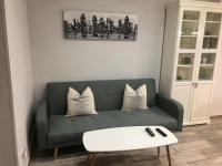 Apartamento estilo nórdico en Malasaña (Madrid Centro)的休息区