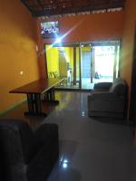 Casa de temporada Lindas Cachoeiras 10的休息区