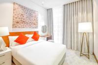 Grand Mercure Dubai City客房内的一张或多张床位