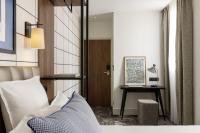 Hôtel Moderniste客房内的一张或多张床位