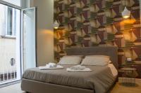 WANDERLUST NAPLES a place to stay客房内的一张或多张床位