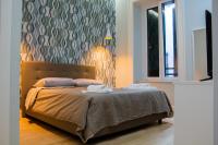 WANDERLUST NAPLES a place to stay客房内的一张或多张床位