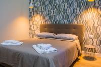 WANDERLUST NAPLES a place to stay客房内的一张或多张床位