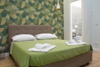 WANDERLUST NAPLES a place to stay客房内的一张或多张床位