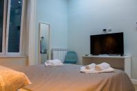 WANDERLUST NAPLES a place to stay客房内的一张或多张床位