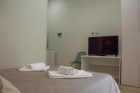WANDERLUST NAPLES a place to stay客房内的一张或多张床位