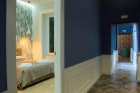WANDERLUST NAPLES a place to stay客房内的一张或多张床位