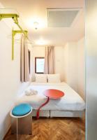Hotel Not Hotel Rotterdam客房内的一张或多张床位