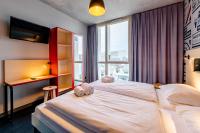 MEININGER Hotel Bordeaux Gare Saint-Jean客房内的一张或多张床位