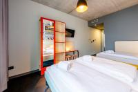 MEININGER Hotel Bordeaux Gare Saint-Jean客房内的一张或多张床位