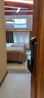 Hotel Havana Loznica客房内的一张或多张床位