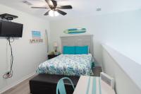 Grand Beach Resort Penthouse 1客房内的一张或多张床位