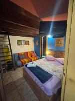 Pousada Casa do Rio Hostel - 8 min do Centro Hístorico - Passeio de Barco com saída da Pousada -Pago a parte- Perto das Praias e Beira Rio客房内的一张或多张床位