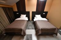 Hotel Havana Loznica客房内的一张或多张床位