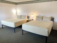Coast Riders Inn客房内的一张或多张床位