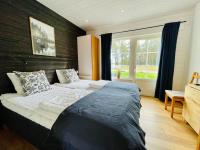 Falun Strandby Främby Udde客房内的一张或多张床位