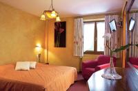 Hôtel A la Vignette - COLMAR-NORD客房内的一张或多张床位