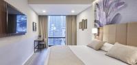 Riu Plaza Manhattan Times Square客房内的一张或多张床位