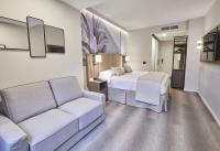 Riu Plaza Manhattan Times Square客房内的一张或多张床位