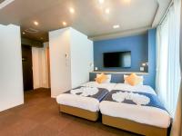 Hotel S-Presso Central客房内的一张或多张床位