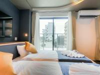 Hotel S-Presso Central客房内的一张或多张床位