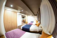 Hotel S-Presso Central客房内的一张或多张床位