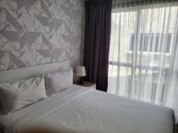 SRITEL BOUTIQUE HOTEL客房内的一张或多张床位
