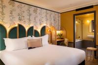Hôtel Jardin de Cluny客房内的一张或多张床位