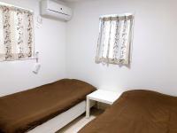 Ano House 女性専用Women's Guesthouse客房内的一张或多张床位