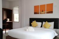 The Lodge at Koh Kood客房内的一张或多张床位