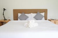 The Lodge at Koh Kood客房内的一张或多张床位