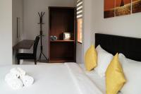 The Lodge at Koh Kood客房内的一张或多张床位