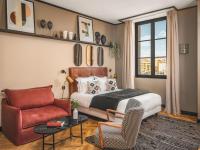 Maisons du Monde Hôtel &amp; Suites - Marseille Vieux Port的休息区