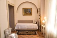Casa Raiola Ercolano Luxury Rooms &amp; Spa客房内的一张或多张床位
