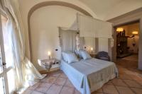 Casa Raiola Ercolano Luxury Rooms &amp; Spa客房内的一张或多张床位