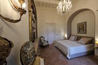 Casa Raiola Ercolano Luxury Rooms &amp; Spa客房内的一张或多张床位