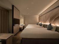 ORIENTAL HOTEL UNIVERSAL CITY客房内的一张或多张床位