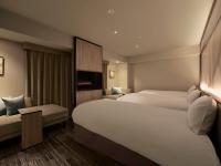 ORIENTAL HOTEL UNIVERSAL CITY客房内的一张或多张床位