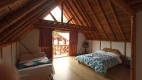 Villa Ester Hostel Vereda Cay客房内的一张或多张床位