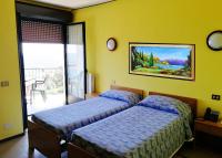 Residence Villa Margherita B&B客房内的一张或多张床位