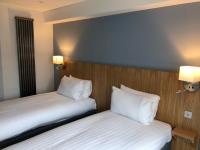 Loch Lomond Hotel客房内的一张或多张床位
