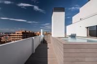 Apartamentos Core Suites Valencia的阳台或露台