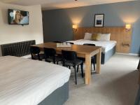 Loch Lomond Hotel客房内的一张或多张床位