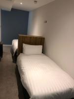Loch Lomond Hotel客房内的一张或多张床位