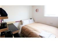 Center Hotel Narita 2 R51 - Vacation STAY 43391v客房内的一张或多张床位