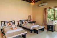 Ocean View Tulamben Dive &amp; Resort客房内的一张或多张床位