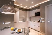Apartamentos Core Suites Valencia的厨房或小厨房