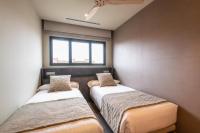 Apartamentos Core Suites Valencia客房内的一张或多张床位