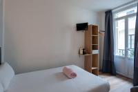 Hotel l'Hotera客房内的一张或多张床位